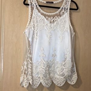 Beautiful cream colored, ribbon embroidered tunic.